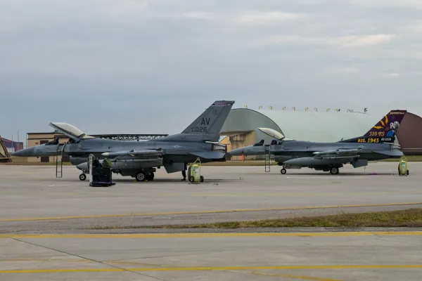Two U.S. Air Force F-16 Fighting Falcons have parked next to each other before taking off to kick-off Exercise Fighting Wyvern at Aviano Air Base, Italy, Dec. 11, 2023. Exercise Fighting Wyvern was the first ever time the 31st Fighter Wing executed a full-scale exercise with the 56th and 57th Rescue Squadrons, the 606th Air Control Squadron and the 510th Fighter Squadron all participating together. (U.S. Air Force photo by Airman 1st Class Zachary Jakel)